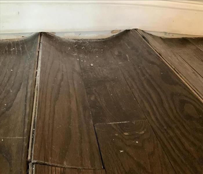 hardwood floor warped due to water damage